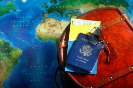 Annual LGBT Travel Survey results revealed Map with passport and airline tickets